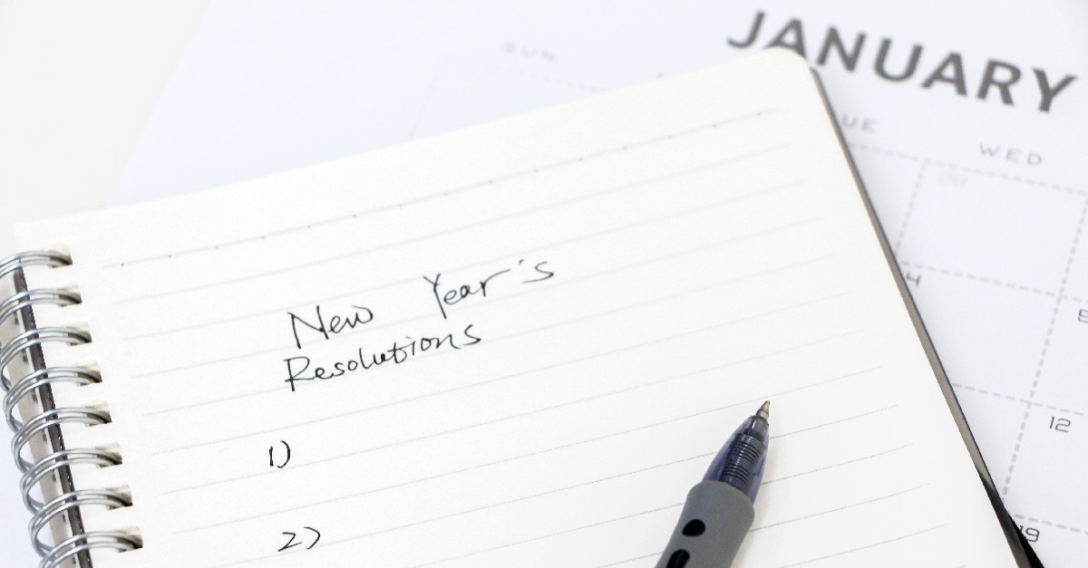 Notepad with New Year's Resolutions written on it