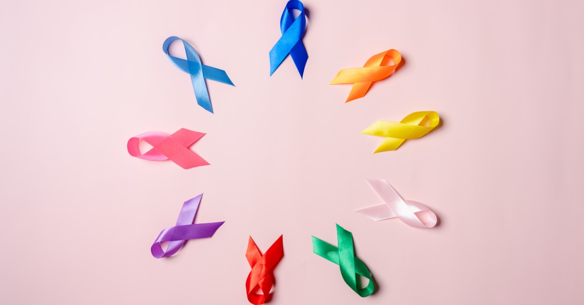 multicolored ribbons on pink background